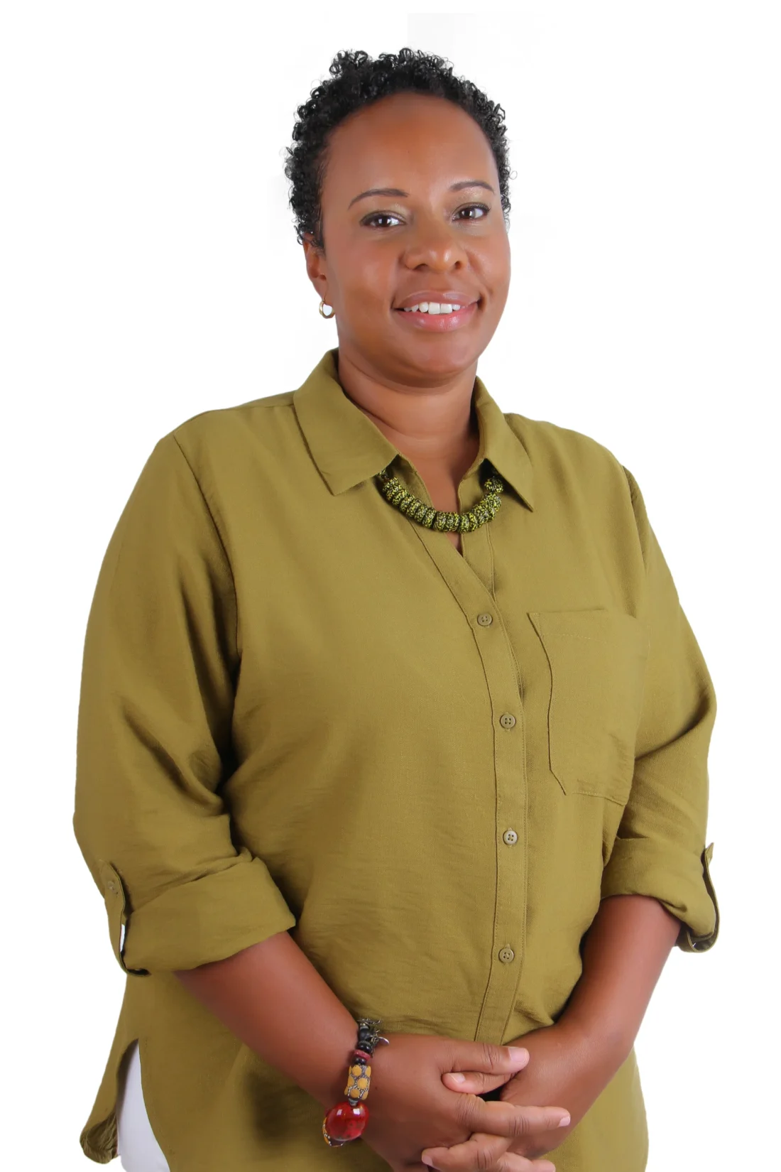Clinician staff member working at TPTC, standing posing for a professional picture wearing a professional outfit.