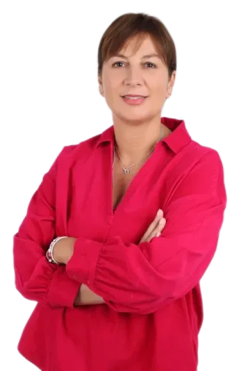 Clinician staff member working at TPTC, standing posing for a professional picture wearing a professional outfit.