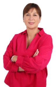 Clinician staff member working at TPTC, standing posing for a professional picture wearing a professional outfit.