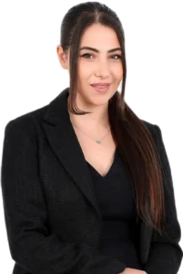 Clinician staff member working at TPTC, standing posing for a professional picture wearing a professional outfit.