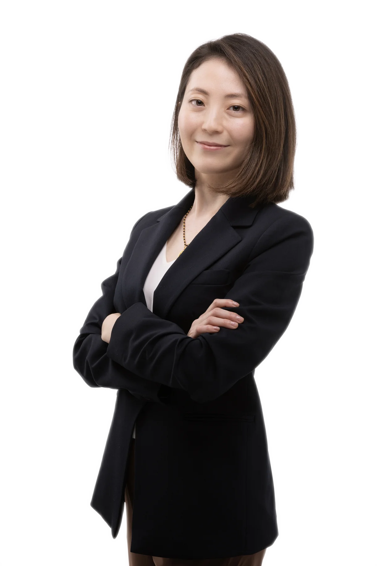 Clinician staff member working at TPTC, standing posing for a professional picture wearing a professional outfit.