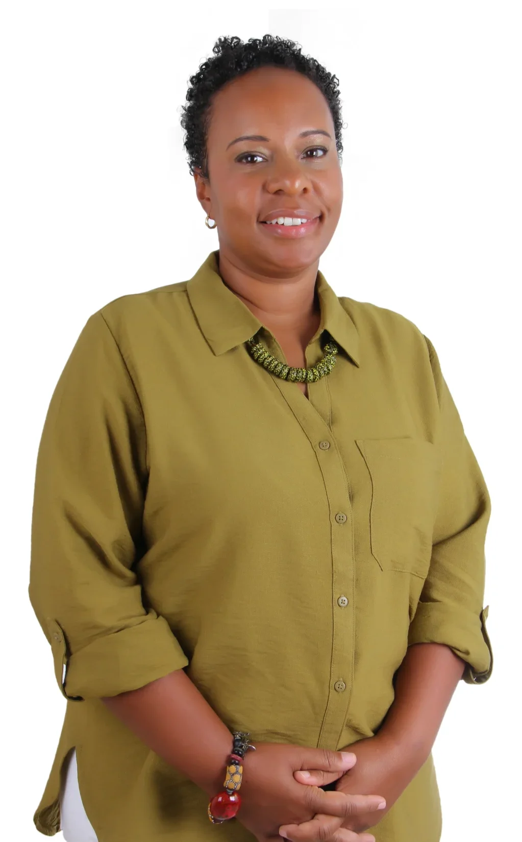 Clinician staff member working at TPTC, standing posing for a professional picture wearing a professional outfit.