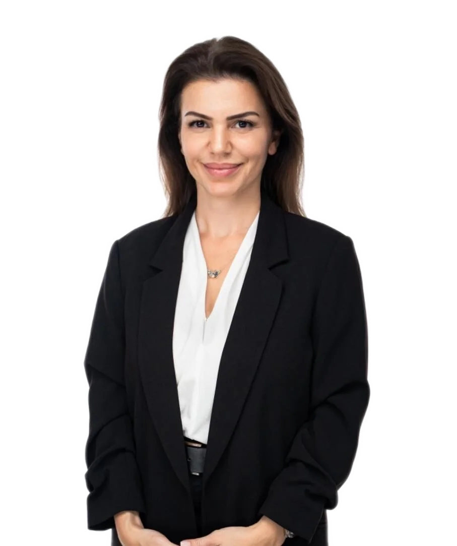 Clinician staff member working at TPTC, standing posing for a professional picture wearing a professional outfit.