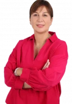 Clinician staff member working at TPTC, standing posing for a professional picture wearing a professional outfit.